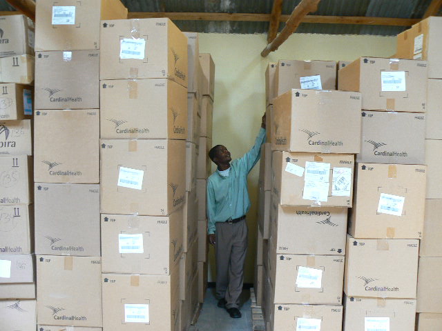 Wilson Tembo stand by medical supplies shipped from the U.S.